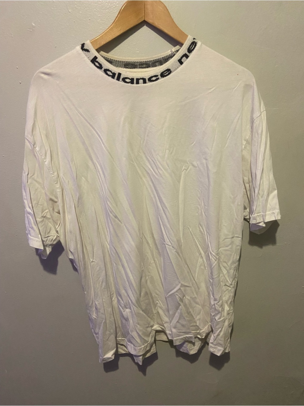 New Balance White Short Sleeve Tee with Black Logo Collar